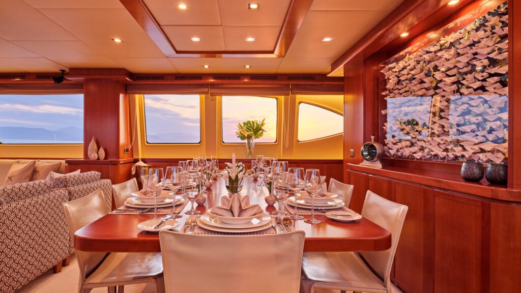 Formal dining room set for dinner, alternate sunset view
