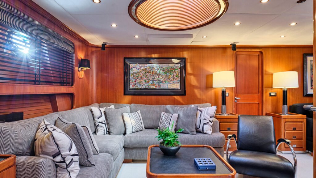 Salon lounge with grey sofa and artwork