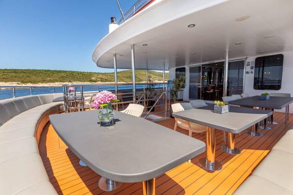 Family waterslide charter yacht, aft deck at anchor