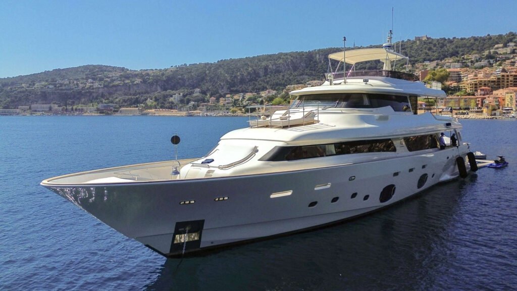 Profile view of motor yacht Centurion near the coast of the French Riviera