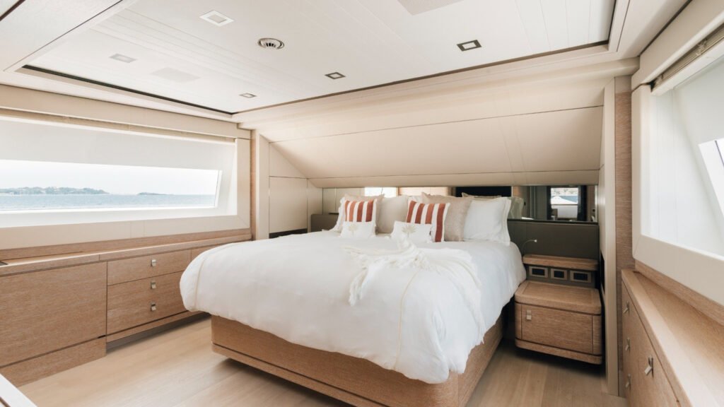 Master cabin with king bed and modern finishes aboard motor yacht Centurion