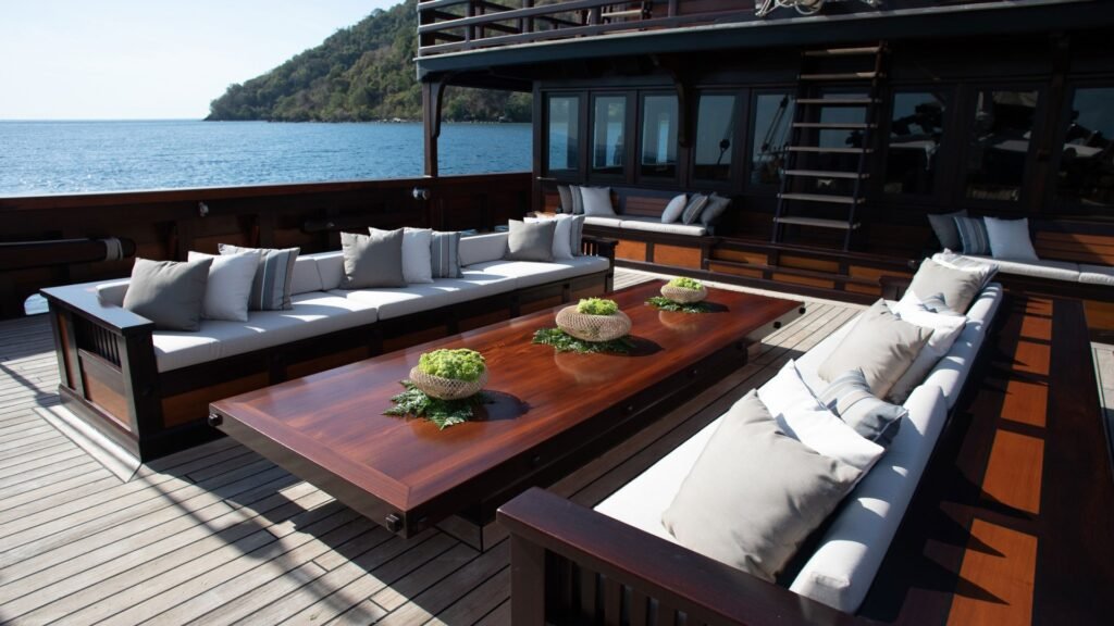 Thailand Phinisi yacht charter, traditional ironwood vessel at anchor in Phang Nga Bay