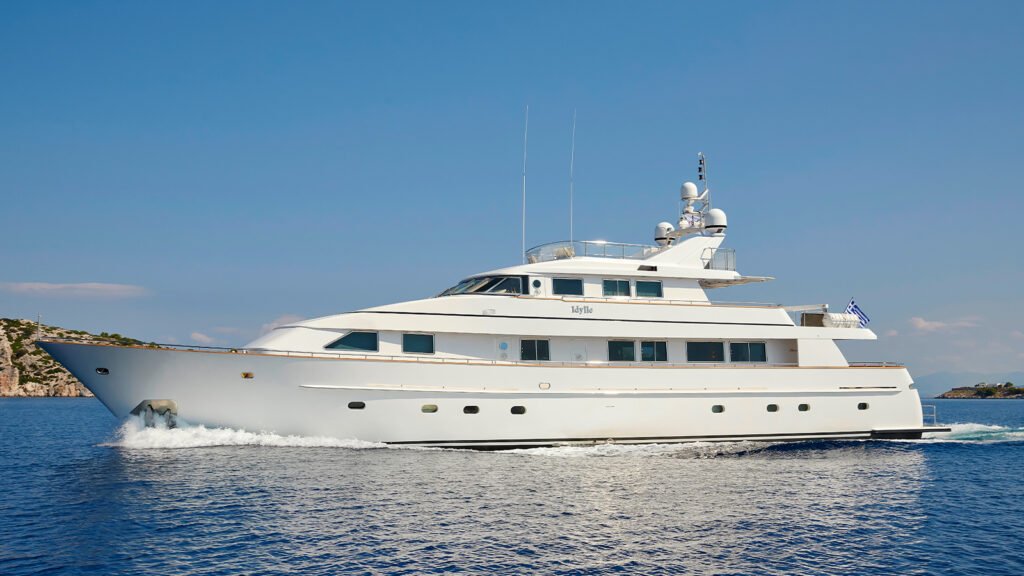 Cannes classic charter yacht, teak deck and varnished spars near Cap d'Antibes