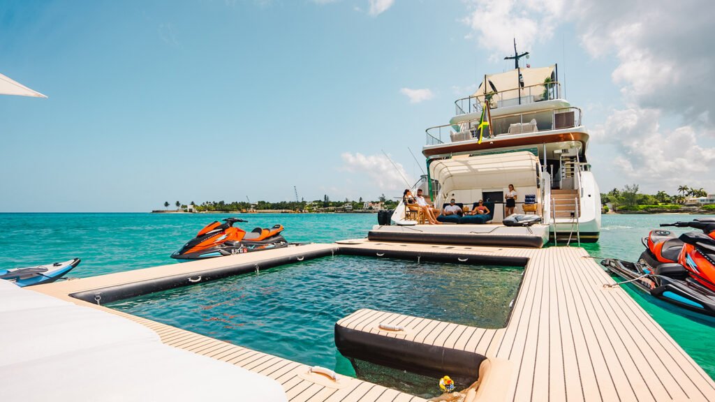 FunAir sea pool and floating dock deployed off the stern of KOJU