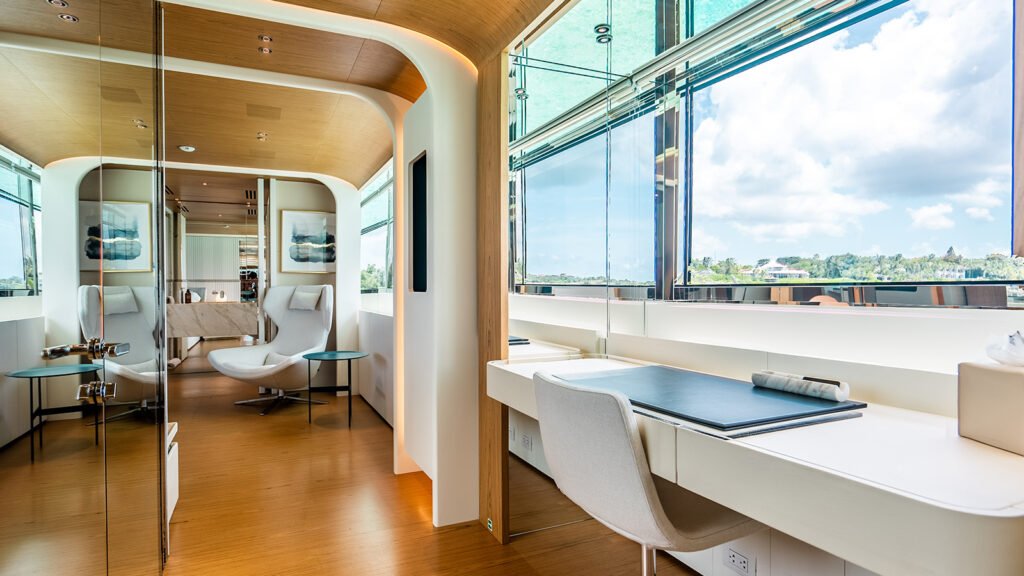 Study aboard KOJU with desk and swivel armchairs