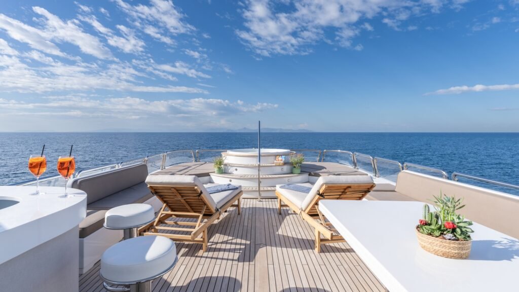 Family charter yacht Olbia Sardinia, exterior at anchor with Tavolara backdrop