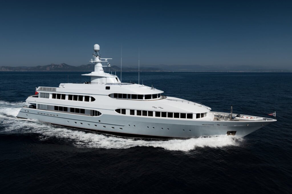 Feadship superyacht Bahamas charter, foredeck and island backdrop