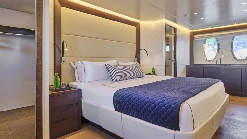 Guest double cabin aboard ONCE MORE with oval portholes