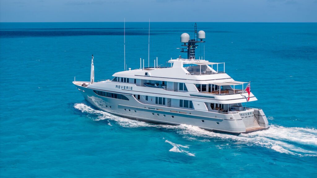 Whitsundays motor charter yacht, aft deck with Hayman Island in background
