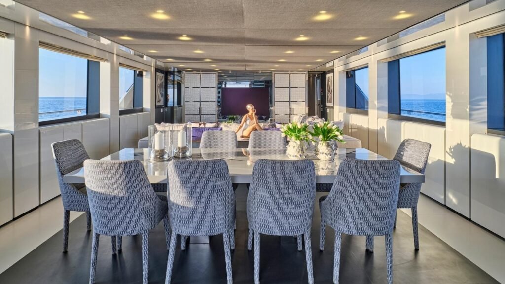 Formal dining room aboard RIANA II seating ten