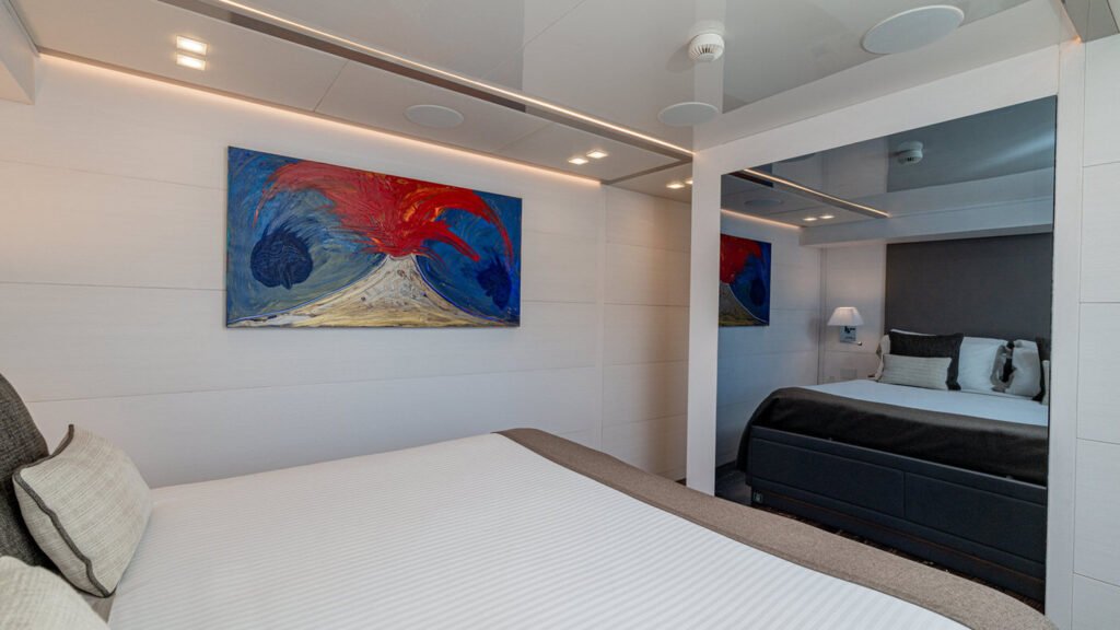 Sands - Yacht Sands guest cabin volcano art and mirror
