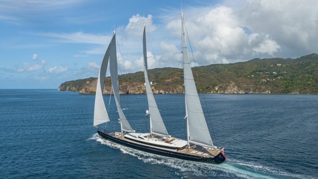 Sailing yacht at Anegada, BVI horseshoe reef in background