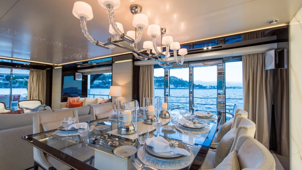 SOULMATE formal dining area with chandelier and set table