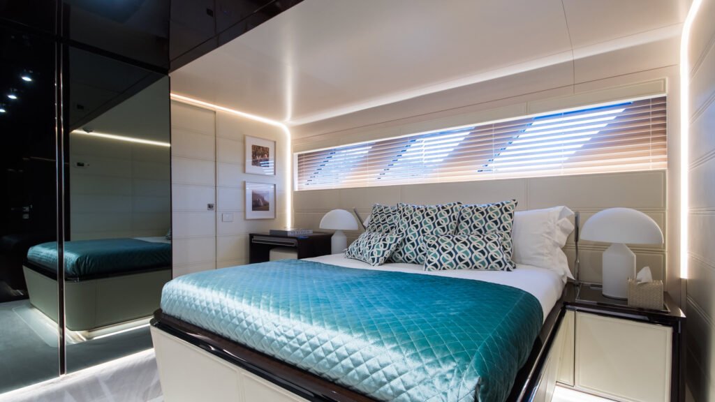 SOULMATE master suite with teal quilted bedding and panoramic view