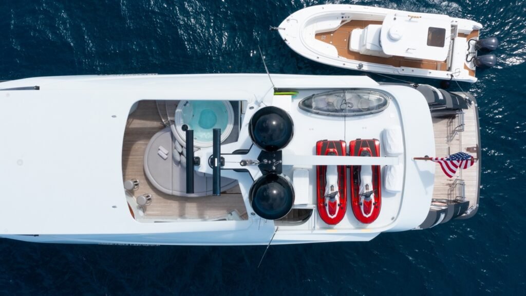 TEMPTATION sundeck jacuzzi and jet skis from above