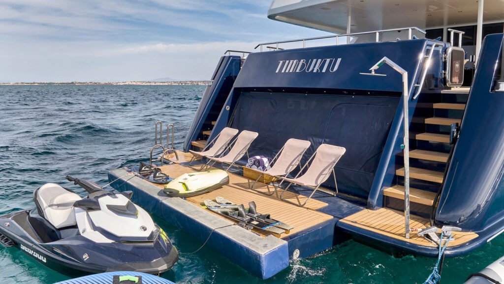 Family charter yacht aft deck, BVI anchorage