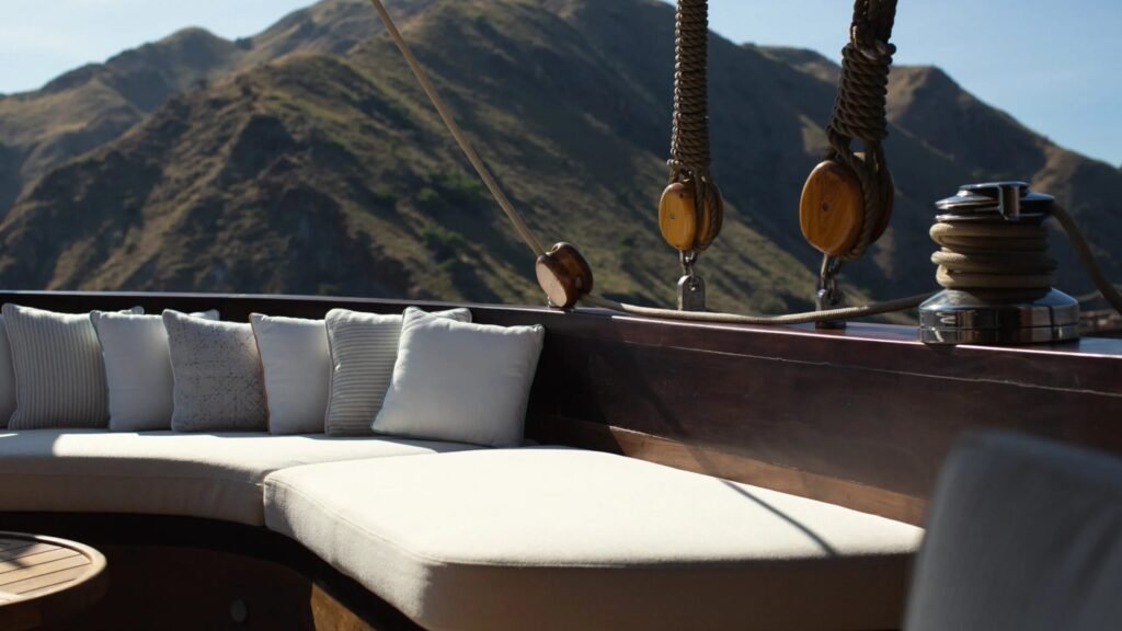 Vietnam sailing yacht charter, vessel at anchor in Ha Long Bay limestone anchorage