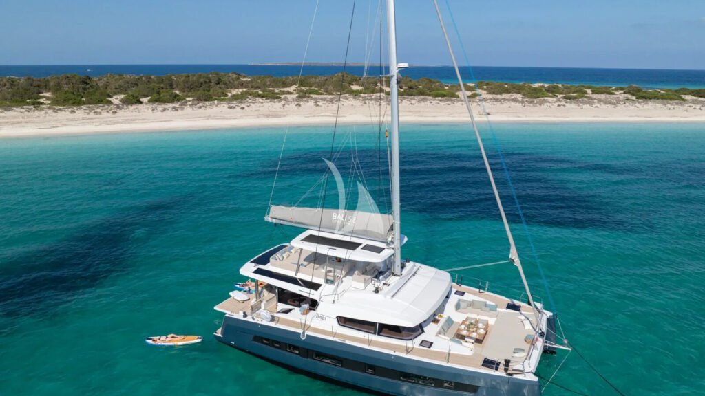 ALISEI - aerial view at anchor over turquoise water