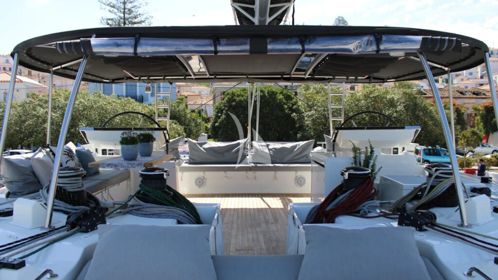 ATLANTIS - shaded flybridge lounge with bar and helm