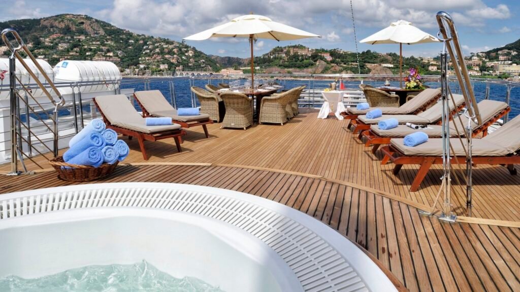 Christina O sun deck with spa pool and loungers