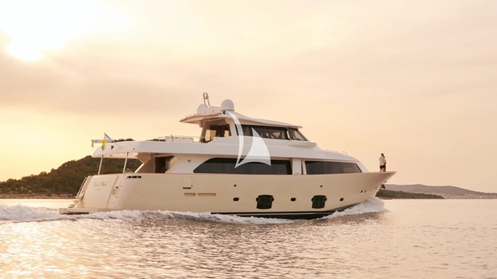 FRIEND'S BOAT - golden-hour profile under way