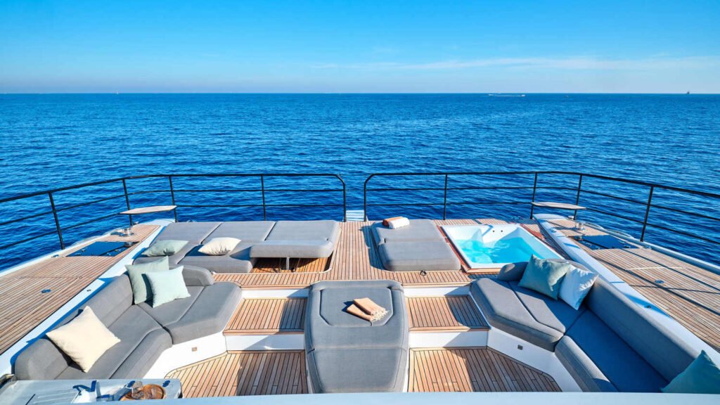 Family yacht charter Balearics, exterior profile at Formentera Ses Illetes beach